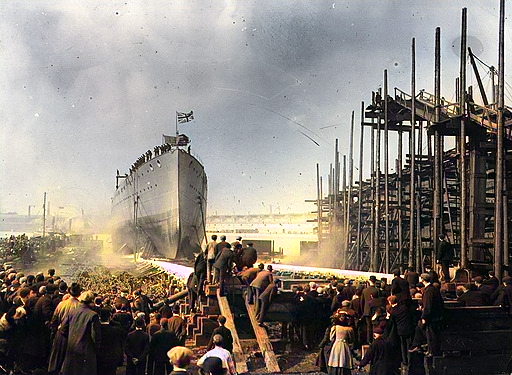 The launching of the British ship ‘Indomitable’ at Glasgow dockyards, on the Clyde. Many great ships and Cunard liners were built in the shipyards on the Clyde including the ‘Aquitania’ and the ‘Queen Mary’. 