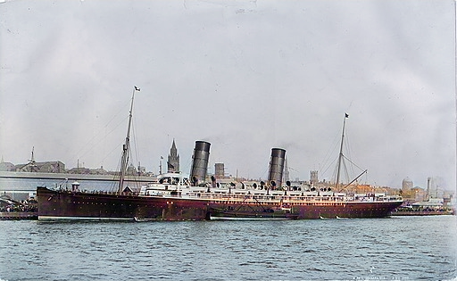 The Cunard liner RMS Campania, built in Glasgow in 1892. She served at the Battle of Jutland, and sank in 1918 after a collision with the HMS Revenge whilst serving as an aircraft carrier. Colourised by HotPot.AI