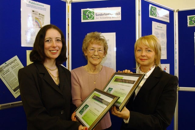 Community workers Judith Docherty, left, and Lily Barker, centre, received awards at the CVS offices 19 years ago.
Here is Gillian McDonough handing over the certificates.