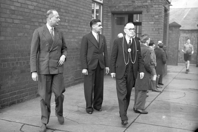 The Duke of Gloucester leaving the waifs rescue agency in West Wear Street in 1936.