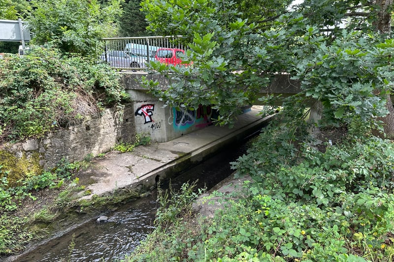 Once you reach Digitech Studio School, you turn left over this small bridge over the brook and to Tower Road North which might be busy with students.