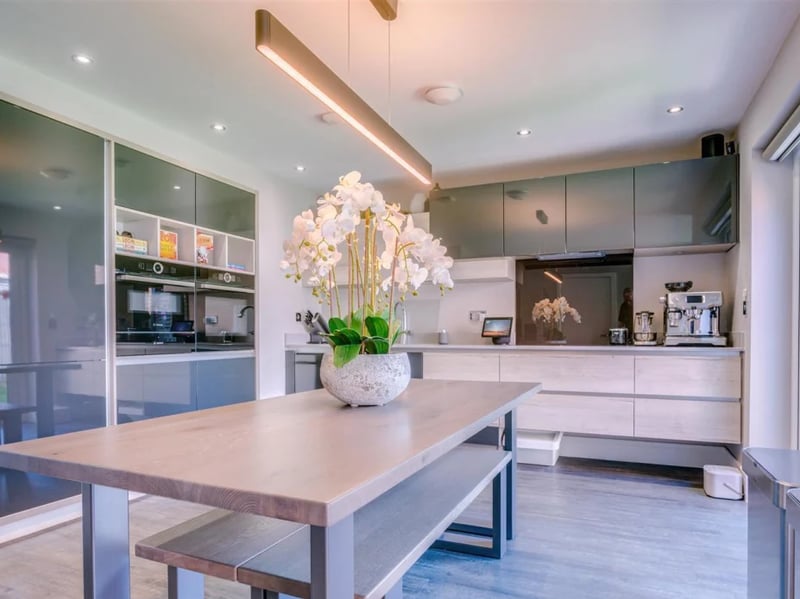 The modern kitchen has been described as the "heart of this magnificent home"