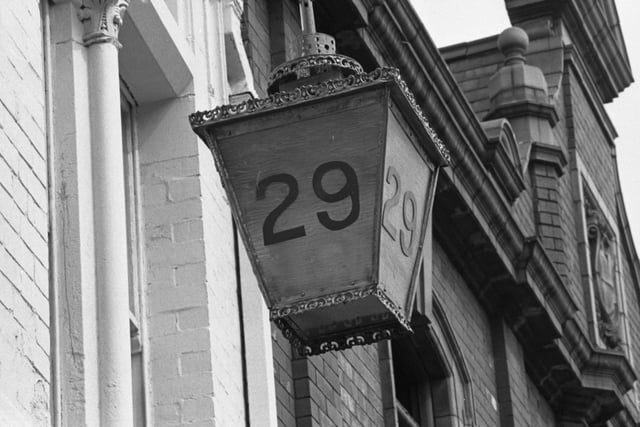 An old fashioned door number outside the pub. Remember it?