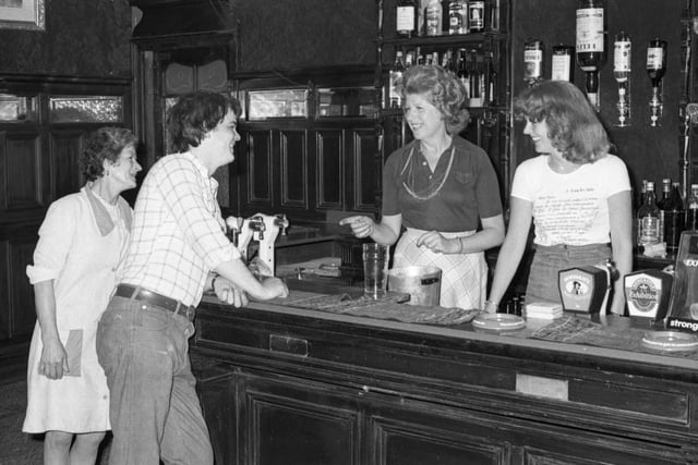 A friendly atmosphere in the pub in 1976.