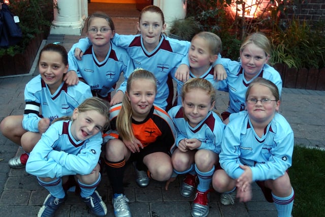 The Ashbrooke Angels under-10 girls team wearing their new kit in 2005.