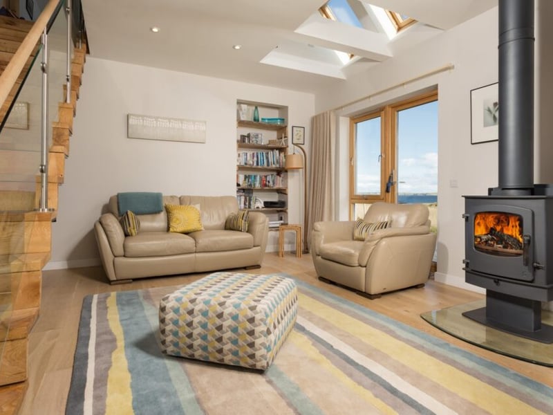 There's plenty of comfy seating and a log burner to make sure nobody gets chilly.