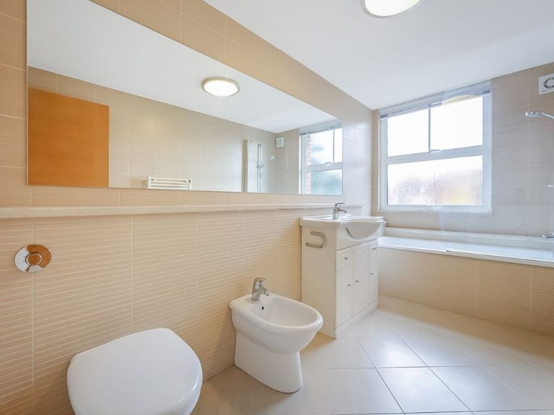The bathroom is a great size with a four-piece set including a combined bath and shower, as well as a bidet (Credit: Alexanders Lettings and Alexander Lets)