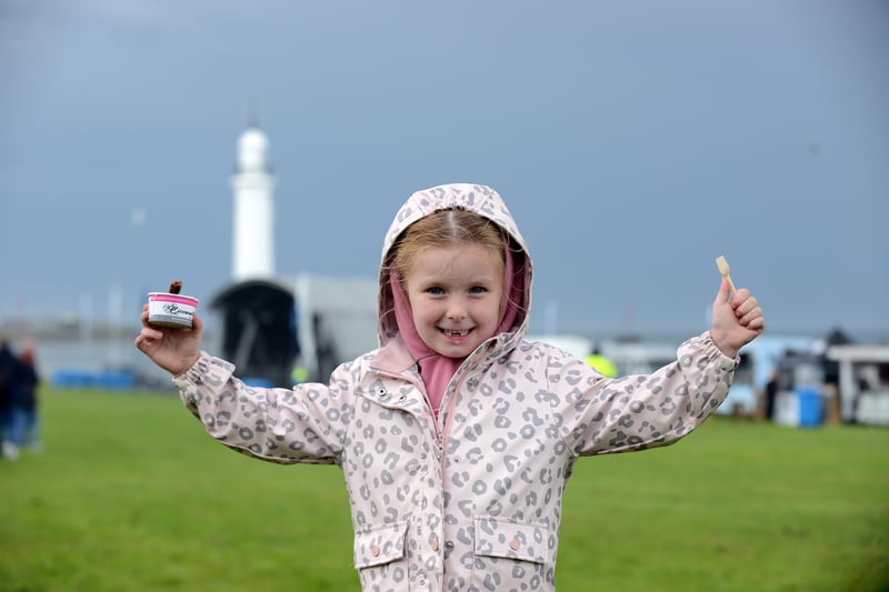 This little girl still found reason to celebrate despite the rain at Sunderland's Summer Streets on Saturday