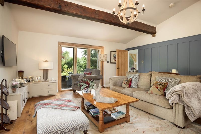 The open living room with exposed beams. (Photo by Monroe Estate Agents)