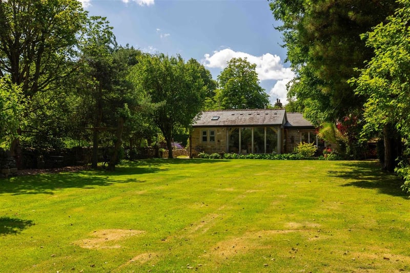 The large lawn offer endless possibilities. (Photo by Monroe Estate Agents)