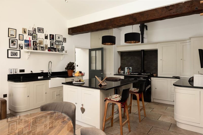 The open dining kitchen with lots of work space and an abundance of character. (Photo by Monroe Estate Agents)
