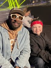 Nine-year-old Theo Hills pictured with will.i.am on the set of The Voice Kids. 