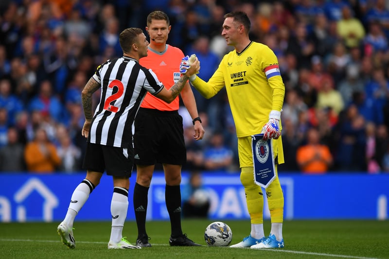 Retiring goalkeeper  Allan McGregor shakes hands with Newcastle United captain Kieran Trippier ahead of kick-off at a packed Ibrox Stadium.