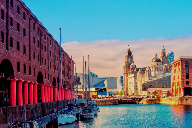 Beautiful image of the Royal Albert Dock, with the Royal Liver Building in the background.