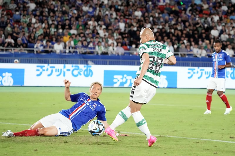 Maeda side-foots home Celtic’s second goal under pressure from a Yokohama defender.