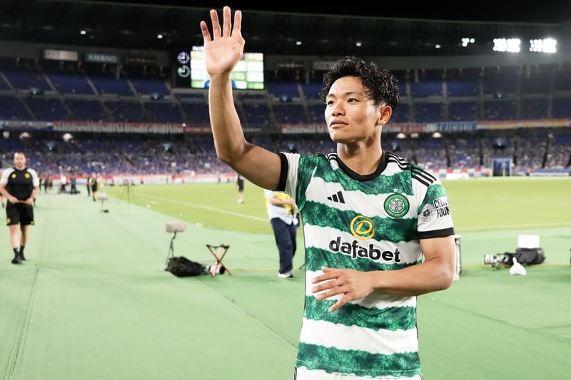 Reo Hatate waves to spectators in the stand as Celtic take part in a lap of the stadium to thank travelling fans for their support.