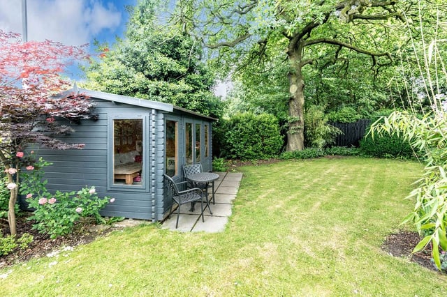 A detached outhouse in the well-kept garden could provide accommodation for guests, a home office, or simply a peaceful area to sit with a book. 