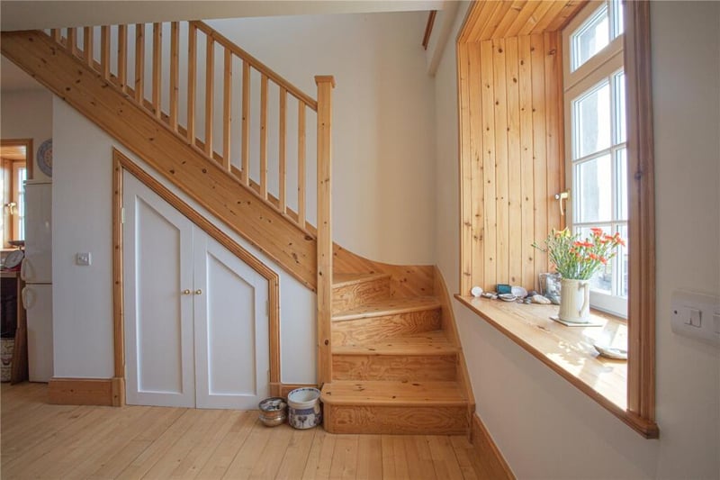 The stairs lead up to the first floor with the master bedroom with ensuite - the other two bedrooms are on the ground floor.
