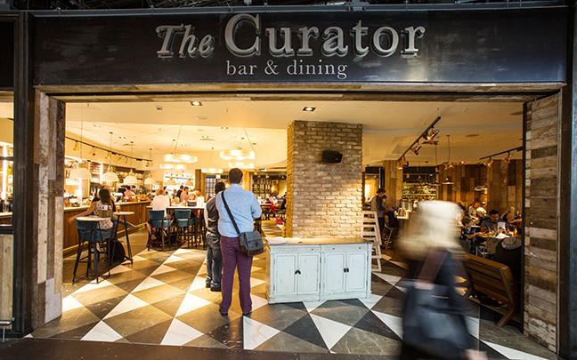 The Curator is a gastro-pub-meets-Bill’s food. It boasts a “soon to be world famous” selection of artisan cocktails, craft beers and ales and a menu inspired by the “ever changing” UK seasons.