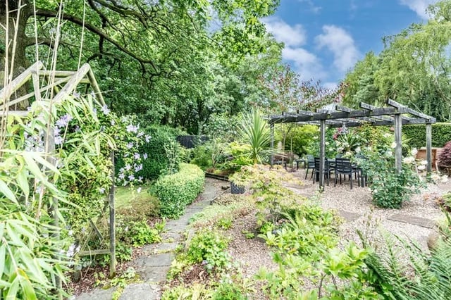 This home has a fabulous landscaped garden which stretches to around one third of an acre. It also has a detached summer house which would be ideal for home workers.