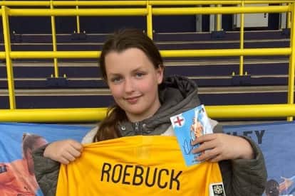 Leah Walton with the signed shirt signed she was given by England goalkeeper Ellie Roebuck. Photo: Craig Walton/PA Wire