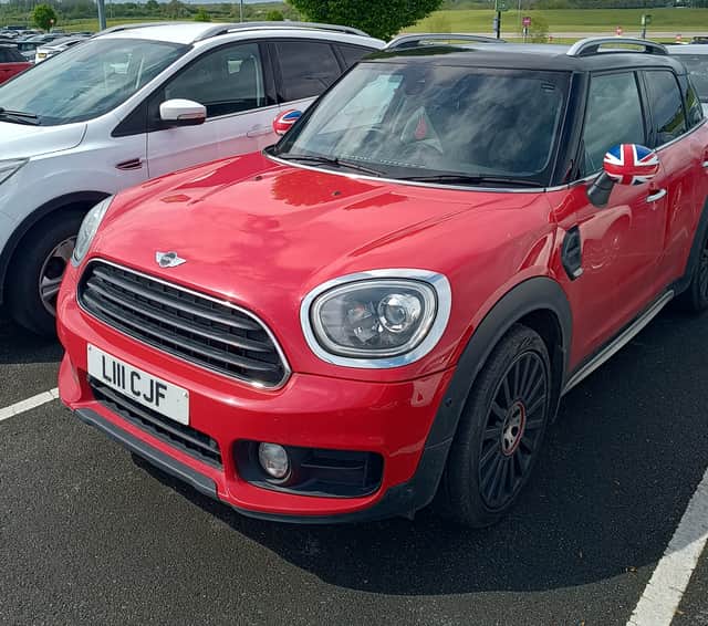 Karen's Mini Countryman has distinctive Union Jack wingmirror covers and a private number plate. 