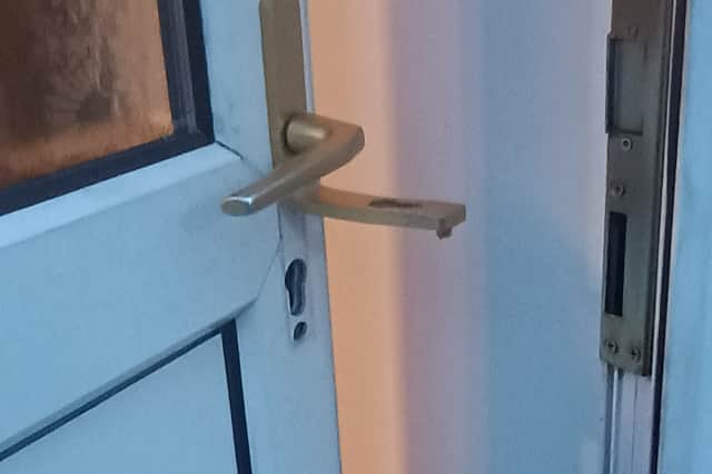 A photo of the broken lock at Karen and Christopher's home. 