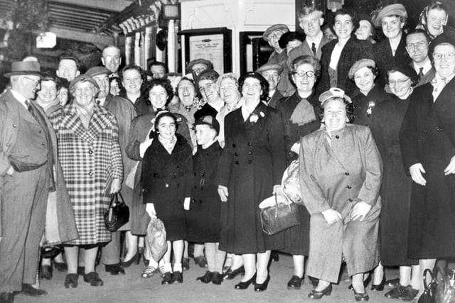 These people were going to London to watch the Coronation in 1953.
