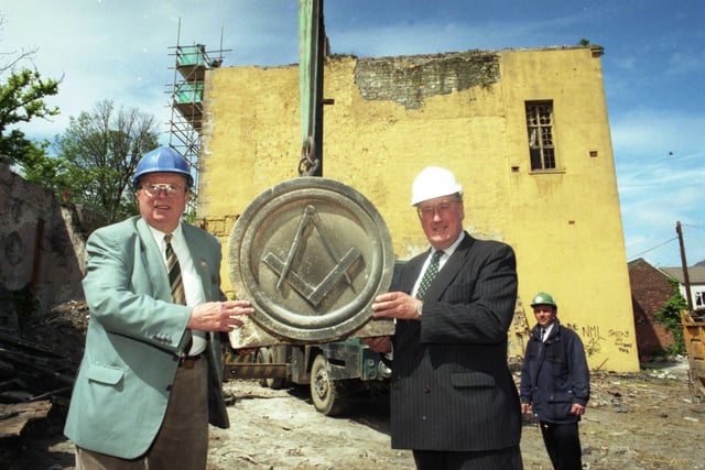 Masonic memories from 25 years ago.
Here is Deputy Provincial Grand Master Charles Marshall handing over the roundel from the front of the Toward Road Masonic Hall to Coun John Mawston, chairman of Beamish Museum joint committee, in 1998.