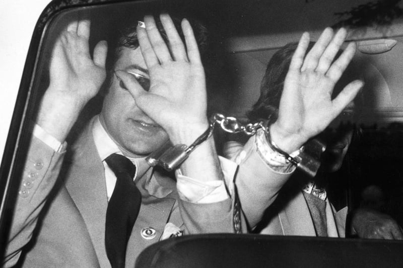 29th June 1967: Mick Jagger  is driven away from Chichester Magistrates Court, where he appeared with West End art gallery director Robert Fraser, left, accused of offences under the Dangerous Drugs Act.
