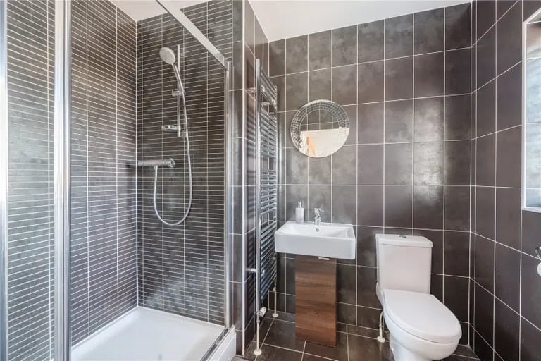 The master bedroom has its own ensuite with a large shower. Picture by Manning Stainton