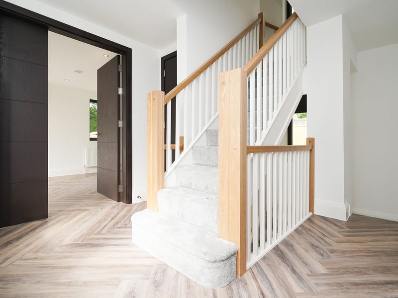 A study and utility room are on the left of the staircase when you come through the front door.