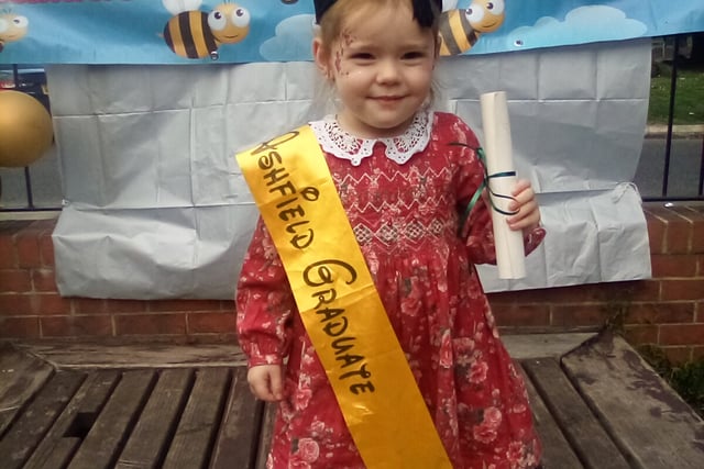 This little girl prepares to say goodbye to Ashfield Nursery