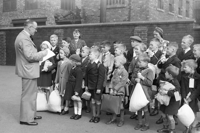 The day before the Battle of Britain started. 
It shows evacuees in Hudson Road getting ready to leave Sunderland for their new homes.