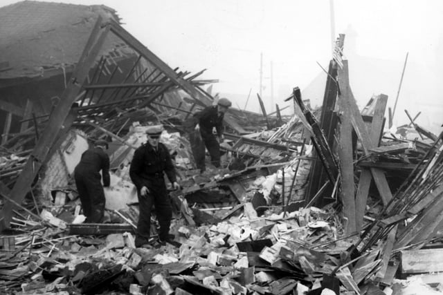 More than 270 people died in Sunderland during bombing from 1940 to 1941.
Workmen were pictured clearing up the debris from another raid. 