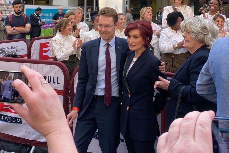 Sharon Osbourne joins West Midlands Mayor Andy Street to welcome Ozzy the Bull to Birmingham New Street after his trip away from the city after the Commonwealth Games