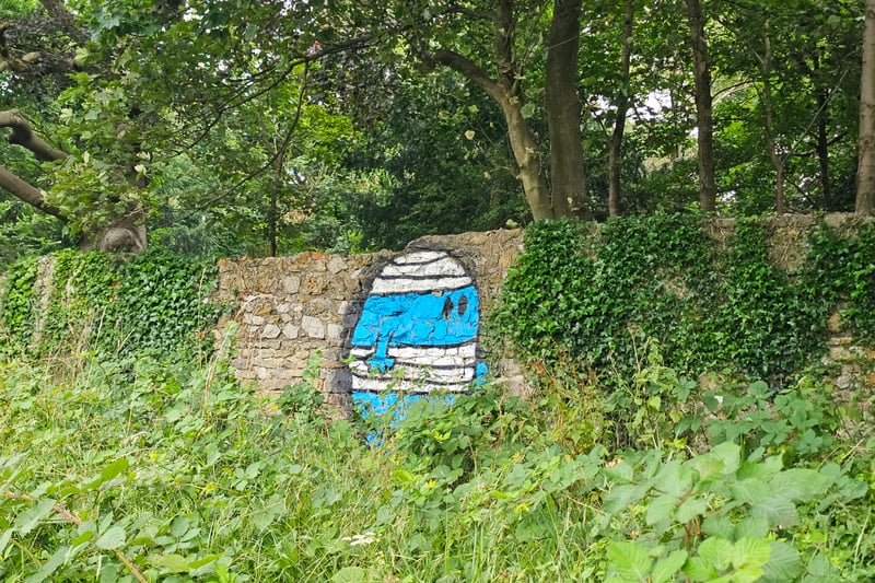 The next Bumpsy was found on a wall in King Weston Estate. The golf course and a sheltered bus stop can be seen from the hill where the wall is.