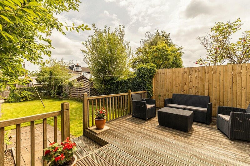 Outside there is a fabulous rear garden with elevated timber deck, paved patio, main section laid to lawn.