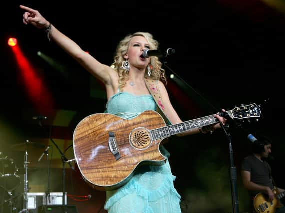 LAS VEGAS - MAY 14:  Musician Taylor Swift performs onstage during the first ever Academy Of Country Music New Artists’ Show Party for a Cause, benefiting the ACM Charitable Fund held at the MGM Grand Ballroom, MGM Grand Conference Center on May 14, 2007 in Las Vegas, Nevada.  (Photo by Ethan Miller/Getty Images)