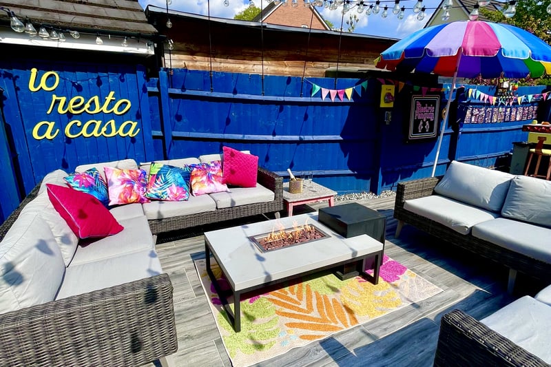 The house has an outdoor area that guests love to spend time in