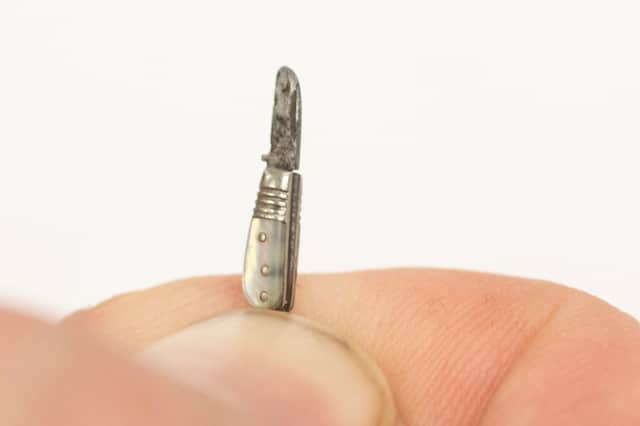 The 'world's smallest penknife', made by a Sheffield craftsman 170 years ago, is heading to auction.