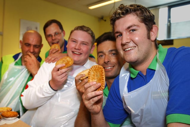 Staff at Asda in Grangetown did their best to scoff through a pile of pies in a competition in 2003.