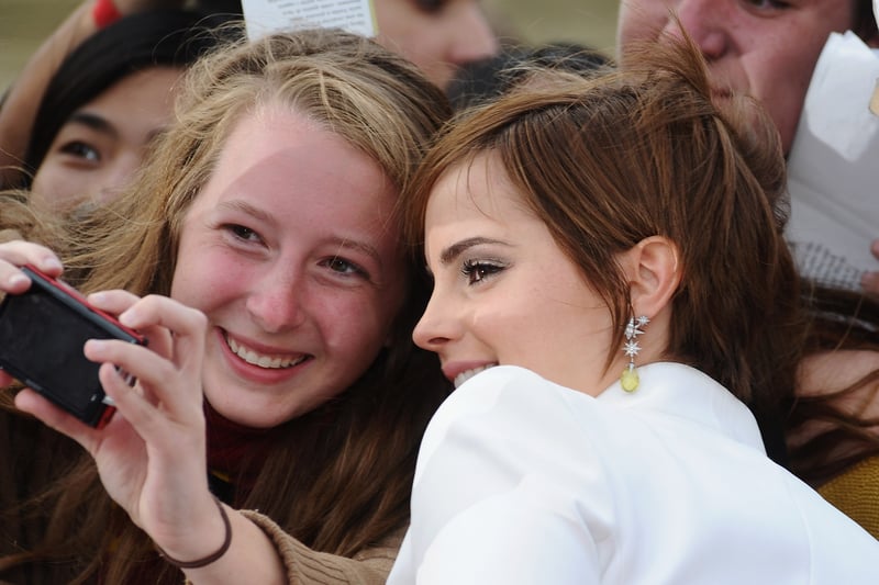 A fan has her photograph taken with Emma Watson at the World Premiere of Harry Potter and The Deathly Hallows - Part 2 at Trafalgar Square on July 7, 2011.  (Photo by Ian Gavan/Getty Images)