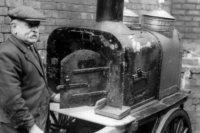 He always wore a suit and he plied his trade in every weather - from blazing sun to snow - from 6pm each day.
That's Jack Reay, the seller who could be found with his hot potato oven in Bedford Street outside the Theatre Royal.
Here he is in 1949. He died 4 years later.