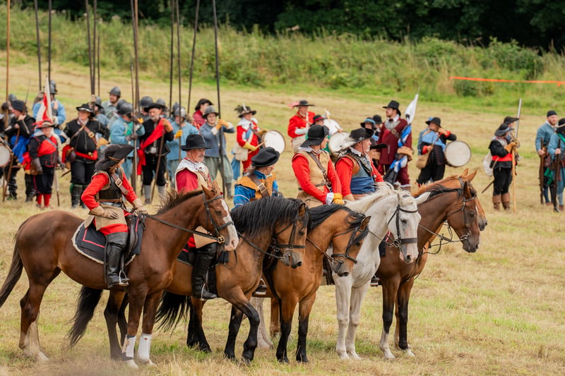 The Cavaliers on horseback get ready to charge into battle.