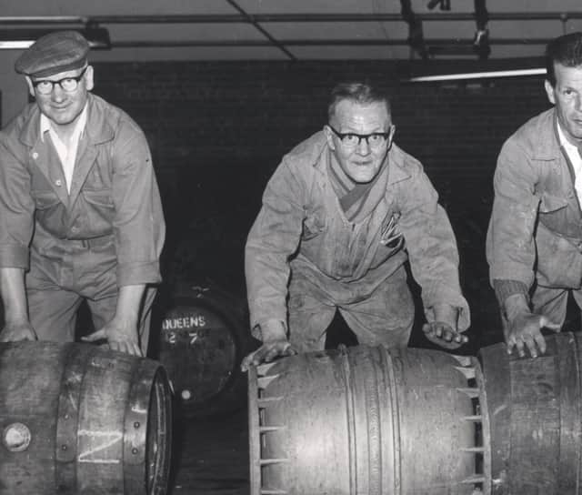 Rolling out barrels at Tennants Exchange Brewery, Sheffield, in July 1962.