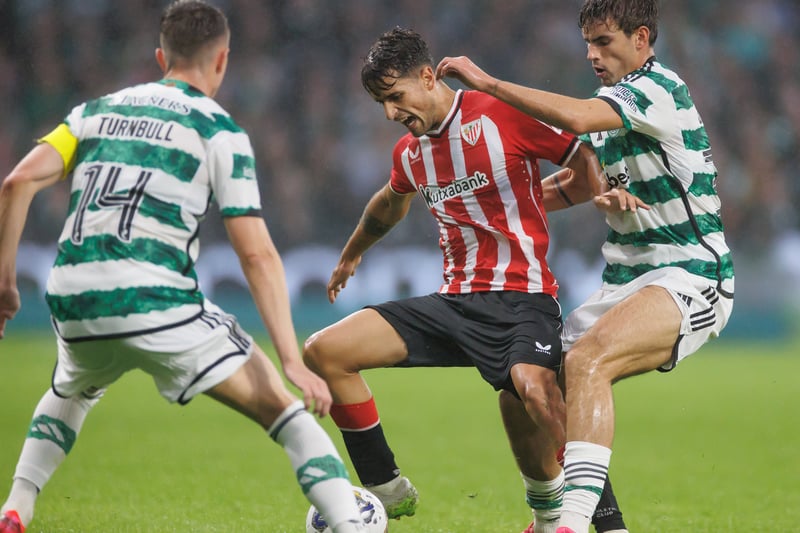 Benat Prados Diaz of Athletic Club does well to retain control of the ball as Matt O’Riley and David Turnbull close in.