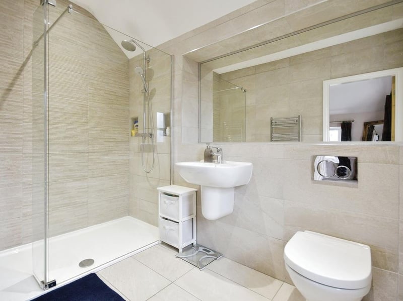 The ensuite to the master bedroom is one of the property's two bathrooms.