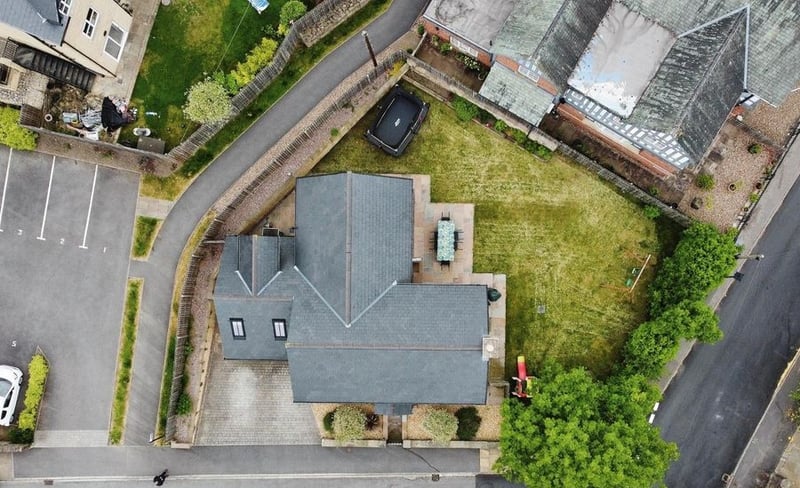 The view from above the property shows just how spacious the exterior is.