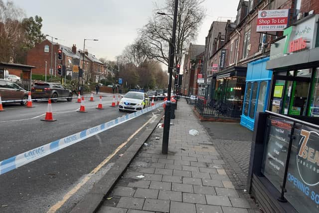 Police on Ecclesall Road, Sheffield, following the shooting in February 2022 
